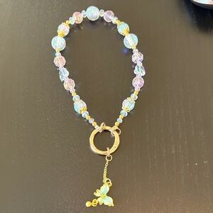 Elegant Gold and Blue Beaded Phone Chain Wristlet